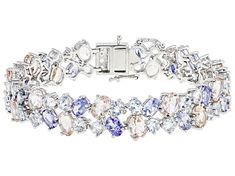 6.25ctw Oval Tanzanite, 6.25ctw Round Aquamarine, 6.25ctw Oval Morganite, And 0.20ctw Round White Zircon Rhodium Over Sterling Silver Bracelet. Measures Approximately 0.47"W. Hidden Box Clasp With Double Safety. Stainless Steel Tongue. Accent stones primarily zircon. Jtv Jewelry, Tanzanite Gemstone, Box Clasp, Pink Gemstones, Aquamarine Gemstone, Rhinestone Jewelry, Blue Gemstones, Sterling Silver Bracelet, March Birth Stone