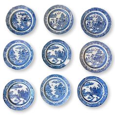 six blue and white plates with different designs