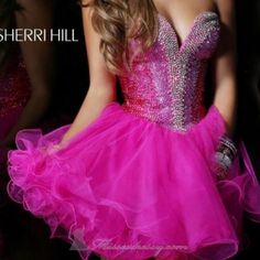 This Is A Stunning Sherri Hill Dressing Excellent Condition! The Bodice Is Covered In Rhinestones With Only One Missing Under The Right Armpit. Beautiful Full Tulle Bottom Giving Princess/Barbie Vibes. Missing Eye To Hook In Eye Clasp Which Could Easily Be Replaced But Stays Up Fine Without. The Missing Rhinestone And Part Of Clasp Both Pictured. Rhinestone Homecoming Dress For Party Season, Rhinestone Dress For Homecoming Party Season, Homecoming Dresses With Rhinestones For Party Season, Crystal Embellished Dresses For Homecoming And Prom, Crystal Embellished Dresses For Homecoming During Prom Season, Pink Fitted Mini Dress With Rhinestones, Cocktail Dress With Rhinestones And Sweetheart Neckline, Mini Dress With Rhinestones For Wedding, Wedding Dresses With Rhinestones Mini Length