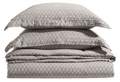 three pillows stacked on top of each other