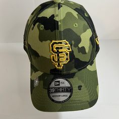 San Francisco New Era Baseball Cap. Size Medium-Large Fitted, Green Camouflage, Polyester/ Spandex, Gold Stitching. Nwt’s Sku: B-29 New Era Baseball Cap, Fitted Baseball Caps, New Era Fitted, Large Hats, Polyester Spandex, Baseball Cap, New Era, Camouflage, San Francisco