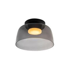 a light that is on top of a white wall mounted ceiling fixture with an orange light in the middle