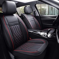 the interior of a car with black leather and red stitching on the front seats