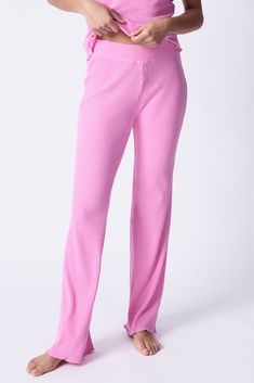 Pink rib high-waisted pant in Repreve x Reloved recycled soft knit. Banded waist with mini-snap fly. Re Purpose, Pink Camisole, Pant For Women, Sleepwear & Loungewear, Pj Sets, Lounge Pants, High Waisted Pants, Plastic Bottles, Bright Pink