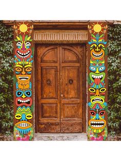 an ornate wooden door with two faces painted on the front and side panels in different colors