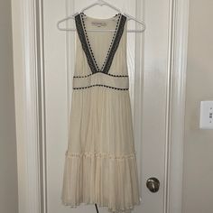 Like New, Never Worn Summer Dress From Corey Lynn Calter Bought From Boutique In Coral Gables, Fl. Would Make A Great Graduation Dress! Has Black Lace Trim On V-Neck And Black Trim On Waist. Inside Dress Is Lined. Lightweight, 100% Cotton. Beige Lace Trim Dress For Date Night, Cream Midi Dress With Lace Trim For Summer, Cream Lined Dress For Brunch, Cream Sundress With Lace Trim, Cream Lined Mini Dress For Brunch, Cream Midi Dress With Lace Trim For Day Out, Cream Mini Dress For Brunch, Lined, Cream Knee-length Dress For Date Night, Chic Cream Mini Dress With Lace Trim