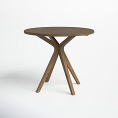 a round wooden table with two crossed legs on an isolated white background in the center