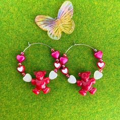 ✨ Cute Hoop Love Bear Earrings ✨ ❤️ Adorable bear design on stainless steel hoop 🐻 ✨Crafted with vibrant resin, plastic, and acrylic beads✨ 🪶Lightweight and comfortable for all-day wear 🕊️ 📐Measures approximately 2.25" 🔒 Stainless steel construction resists rust, tarnish, oxidation, and corrosion, even in humid climates 🌧️ 🍒 Each pair of earrings is meticulously handcrafted by me to ensure the highest  quality 📏 Please note that size measurements are approximate. 🖥️  Kindly be aware tha Trendy Hypoallergenic Hoop Earrings For Valentine's Day, Playful Hypoallergenic Hoop Earrings As Gift, Playful Hypoallergenic Hoop Earrings For Gift, Trendy Nickel-free Hoop Earrings For Valentine's Day, Plastic Hoop Jewelry Gift, Plastic Hoop Earrings Gift, Plastic Hoop Earrings For Gifts, Plastic Hoop Earrings As Gift, Small Plastic Hoop Earrings Gift