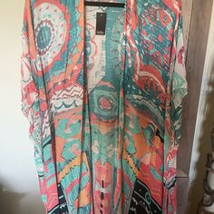 100% Viscose, Approximate 38 In. From Neck To Hem, Shades Of Turquoise, Navy, Melon Orange, White, Tag Attached Flowy Multicolor Tunic Cover-up, Casual Multicolor V-neck Kimono, Multicolor V-neck Kimono For Beachwear, Casual Multicolor Boho Print Cover-up, Casual Multicolor Flowy Kaftan, One Size Multicolor Beachwear Cover-up, Casual Multicolor Boho Print Kaftan, Orange Open Front Kimono For The Beach, Multicolor One-size Summer Kaftan