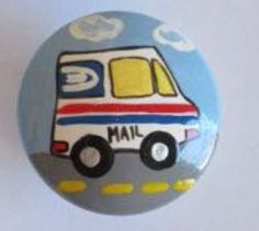 a button with a bus painted on it