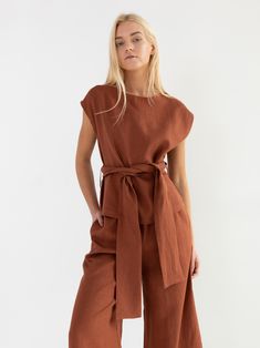 "ALEXANDRA is a linen tie waist top. DETAILS - Cap sleeve design - Crew neck - Self tie belt - 100% lightweight European linen fabric - Cut and sewn to order just for you in our studio COLOR - Rust, you can also choose other colors above - Fabric samples are available here https://www.etsy.com/listing/586569696/linen-fabric-samples SIZING & FIT - Relaxed, loose fit - Length (shoulder to hem) is approximately 22.5 inches / 57 cm - Bust (pit to pit) is approximately 20.5 inches / 52 cm - Shoul Casual Belted Tops For Work, Linen Tie Waist Top For Summer, Summer Linen Top With Tie Waist, Summer Linen Tops With Tie Waist, Casual Wrap Blouse With Tie Waist, Brown Linen Blouse For Work, Casual Spring Belted Blouse, Brown Linen Tops For Spring, Brown Linen Spring Tops