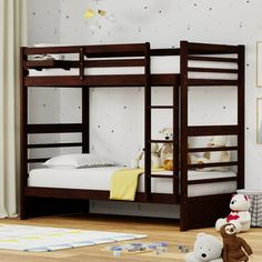 a child's bedroom with bunk beds and teddy bears on the floor in front of it