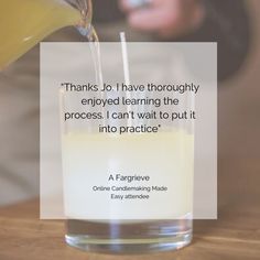 a person pouring liquid into a glass on top of a wooden table with a quote above it