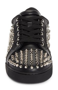 Gleaming metallic cone studs spike the upper of a leather low-top sneaker brightened up with a red logo-debossed tread. Lace-up style Wipe with a soft, dry cloth and store in a dust bag Leather upper/leather and textile lining/synthetic sole Made in Italy Streetwear Lace-up Sneakers With Rhinestone Rivets, Luxury Spiked Sneakers For Streetwear, Punk Low-top Sneakers With Studded Outsoles, Low-top Sneakers With Rhinestone Rivets For Streetwear, Casual Leather Sneakers With Rivets, Low-top Leather Sneakers With Rivets, Spiked Lace-up Leather Sneakers, Punk Sneakers With Spikes And Round Toe, Edgy Leather Sneakers With Spikes