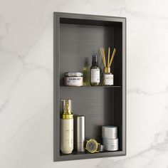 a bathroom shelf filled with personal care items