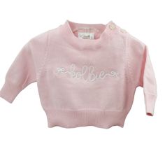 Baby girls pink monogrammed sweater features round crewneck and is made of soft lightweight cotton.  Personalized sweater makes a great baby shower gift. 100% Cotton Machine washable Pink Long Sleeve Sweatshirt With Name Print, Personalized Pink Long Sleeve Sweater, Personalized Pink Top For Spring, Personalized Pink Tops For Spring, Personalized Pink Crew Neck Sweatshirt, Personalized Pink Crew Neck Sweater, Personalized Pink Sweater For Winter, Personalized Cute Crew Neck Sweater, Pink Long Sleeve Top For Gender Reveal