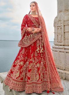 Traditional Bridal Red Silk embroidered lehenga choli AA143Desc: Style : Circular Lehenga Color : Red Fabric : Silk  Work :Haevy Embroidery Wash Care : Dry clean Sleeve Style : Half Sleeve Long Sleeves : Done only in Custom Stitch Sleeves Lining : Done only in Custom Stitch Bust Size : 32 to 42 Inches Occasion : Wedding Mehendi Engagement Reception Ceremonial Baby Shower Party Wear:Semi stitch lehenga choli.Size till 42 inch.heavy bridal lehenga choli Pink lehenga choli silk...