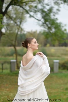 "Absolutely gorgeous, light, so gentle and comfy at the most important day of your life - this hand knitted wedding shawl will provide warmth and cover up, and will serve as beautiful accessory as well as memento after wedding day! This hand-knitted wool shawl has loose silhouette and design that will suit just any bride! Shawl has attachable long sleeve arm warmers that can be used or not, depending on the wedding day. This flowy bridal shawl is made from mixed wool yarn, that will make you war Elegant Wedding Sweater For Winter, Elegant Winter Wedding Sweater, White Long Sleeve Wedding Sweater, Bride Shawl, Wool Leg Warmers, Bridal Cover Up, Hand Knit Shawl, Colors Wedding, Hand Knit Socks