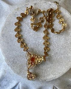 Elegant Italian Art Nouveau Gold Gilt Silver Filigree Vintage Antique Cameo Necklace Shade variations to the gold gild do to age, does not take away for the unique beauty of these earrigs See pictures of earrings next to ruler for scale See matching earrings in link below https://www.etsy.com/listing/792775332/elegant-italian-art-nouveau-gold-gilt?ref=related-2&pro=1&frs=1 Antique 22k Gold Engraved Jewelry, Victorian 22k Yellow Gold Jewelry, Antique Engraved 22k Gold Jewelry, Ornate Baroque Yellow Gold Jewelry, Ornate Baroque Jewelry With Intricate Design, Victorian 22k Gold Hallmarked Jewelry, Vintage 22k Gold Engraved Jewelry, Antique Baroque Yellow Gold Jewelry, Vintage 22k Gold Jewelry For Festive Occasions