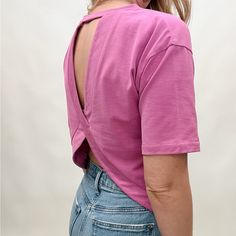 Show Off Your Playful Side In Our Open Back Tee. Made With Lightweight Fabric And A Bold Magenta Color, This Top Is Perfect For Yoga Or Pairing With Denim. Embrace The Unexpected With Our Unique Design. Don't Miss Out On This Must-Have Piece! Contents: Cotton Blend Imported Trendy Purple Everyday Top, Purple Tops For Everyday Spring Wear, Purple Everyday Spring Top, Purple Everyday Spring Tops, Pink Fitted Tops For Everyday, Fitted Pink Top For Everyday, Chic Crop Top T-shirt For Spring, Chic Spring Crop Top T-shirt, Purple Relaxed Fit Tops For Day Out