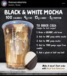 the starbucks coffee cup has been decorated with black and white mocha, which is in front of a chalkboard