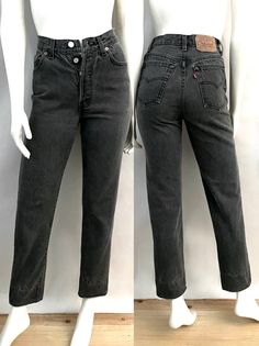 "Vintage 80's Levi's 501 Jeans USA, Black, Button Fly, Denim (Size 4) These 1980's Ladies Levi's Jeans come in a faded black (almost gray) wash and are high waisted with a button fly with a straight leg with the signature red Levi's logo tab. The denim is medium weight and without stretch.  100% Cotton Made in USA *These jeans are in excellent condition with the original bottom hem was shortened (photo #10) *Free shipping within the US, and will go Priority Mail for a quick delivery! Size: (S) Modern Day 4 Waist: 25\" Hips: 34\" Inseam: 28\" Rise: 10 1/2\" (front) 14\" (back) Leg Opening: 6 3/4\" Weight: 1 pound 6 oz *Follow Freshandswanky on Instagram" Hamptons Dress, Levis 501 Black, Levi 501 Jeans, Burgundy Shorts, Disco Shirt, Black Levis, 501 Jeans, Bell Bottom Pants, Levi's 501