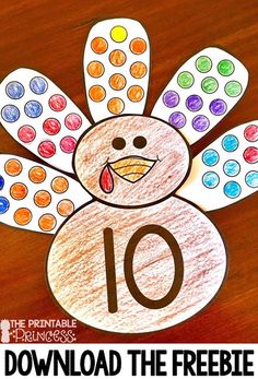 a paper turkey with the number ten on it's side and text overlay that reads