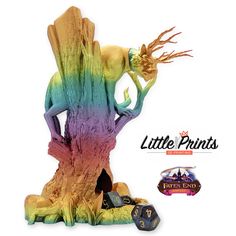 a little prince figurine sitting on top of a tree stump next to dice