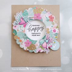 a close up of a greeting card with flowers on it and a happy birthday message in the center