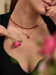 Our dazzling Princess Cut Lab Grown Ruby Pendant Charm is a true embodiment of elegance and ethical luxury. This exquisite pendant features a brilliant 2-carat princess-cut lab-grown ruby, meticulously crafted to showcase its fiery red hue and exceptional sparkle. Suspended from a delicate chain, this charm adds a touch of sophistication and allure to any neckline. Embrace the beauty of lab-grown gemstones and make a bold statement with this radiant pendant charm. Details Recycled Silver: 18ct g Luxury Ruby Jewelry Gift, Luxury Ruby Jewelry Radiant Cut, Luxury Radiant Cut Ruby Jewelry, Luxury Red Brilliant Cut Jewelry, Elegant Red Diamond-cut Necklace, Elegant Red Diamond Cut Necklace, Elegant Red Diamond Cut Necklaces, Fine Jewelry: Brilliant Cut Garnet, Fine Jewelry Garnet With Brilliant Cut