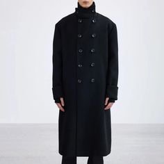 Sleek Buttoned Wool Overcoat - chiclara Classic Black Long Pea Coat, Classic Long Black Pea Coat, Black Long Single Breasted Outerwear, Oversized Black Double-breasted Pea Coat, Modern Tailored Black Wool Coat, Fitted Black Wool Coat With Stand Collar, Black Tailored Long Pea Coat, Black Single-breasted Wool Coat For Spring, Tailored Black Long Pea Coat