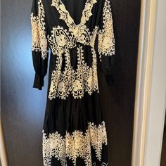 Beautiful Cotton Dress In Black With Cream Lace Inserts, Made In Italy . Perfect For Vacation As A Cover Up Or Dinner. Cream Long Sleeve Midi Dress With Lace Trim, Cream Maxi Dress With Lace Patchwork, Cream Long Sleeve Lace Maxi Dress, Cream Lace Long Sleeve Maxi Dress, Long Sleeve Maxi Dress With Lace Trim For Brunch, Cream Lace Long Sleeve Midi Dress, Cream V-neck Dress With Lace Patchwork, Beige Long Sleeve Maxi Dress With Lace Trim, Gowns With Sleeves