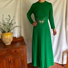 "Vintage Green Evening Dress, Formal Long Dress, Size 10, 1960s Emerald Green Glass Beaded at Waist Floor length, scoop neck, empire waist with pleating under the breast line, glass bead embellishment at the waist, long sleeve, zips up the back. Good clean condition, no stains, rips, tears.  A couple beads are missing from the waist adornment.  Just on top of one of the petals on the flower, and the bottom petals on the other.  Measures:  56\" Length 36\" bust (measured pit to pit) 22\" sleeve ( Evening Gown Wedding, Formal Long Dress, Wedding Retro, Green Evening Dress, Long Sleeve Evening Gowns, Mother Of Bride, Dress Formal, Red And White Stripes, Formal Evening Dresses