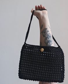 Recycled cotton bag * Hand crocheted Unique numbered bag - Black 04 Width: 21.5 cm Height: 17.5 cm Shoulder strap length: 40 cm The bag is handmade and may have size variations. Being a flexible material, its size changes when it is filled. Black Square Cotton Bag, Eco-friendly Black Crochet Tote Bag, Black Crochet Bag For Daily Use, Eco-friendly Black Crochet Shoulder Bag, Eco-friendly Handmade Black Crochet Bag, Eco-friendly Black Crochet Bag, Black Square Crochet Bag For Everyday Use, Black Crochet Tote Bag For Everyday, Handmade Black Crochet Bag For Daily Use