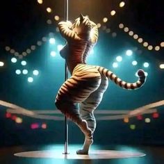 a tiger is standing on its hind legs in front of a pole with lights behind it