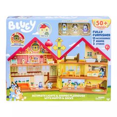 a toy house with furniture and accessories in the box for sale on a white background