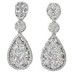 A FABULOUS pair of classic diamond drop earrings. 4.36 carats of F color VS clarity round brilliant cut diamonds set in 18k white gold. These earrings are full of life -- very brilliant! They measure approximately 1.25 inches from top to bottom. A must have! Earrings Multiple, Gold Tassel Earrings, Yellow Gold Diamond Earrings, Expensive Diamond, Gold Diamond Earrings Studs, Art Jewelry Design, Diamond Cluster Earrings, Gold Diamond Studs, Yellow Gold Earrings