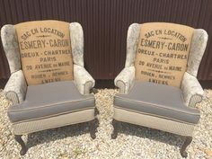 two chairs sitting next to each other on gravel