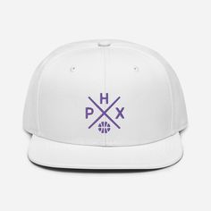 "Made of a premium wool blend with a high-profile, flat bill design, this Phoenix basketball snapback cap is sure to be a winner with loyal followers of Suns basketball and anyone who is from the 602 -- Phoenix, AZ. Features an old school vintage Phoenix basketball team design with cross. A cool and unique option for Sun fans, this adjustable snapback Phoenix hat is an awesome gift for a birthday, holiday, Christmas or game day. * High-profile, structured 6-panel basketball hat * 85% acrylic, 15 Custom Logo Snapback Hat For Sports Events, Custom Logo Flat Bill Snapback Hat For Sports Events, Custom Logo Flat Bill Snapback For Sports Events, Sports Snapback Hat With Custom Logo, White Snapback Hat For Streetwear With Flat Crown, White Snapback Baseball Cap With Custom Logo, White Snapback Hat With Custom Logo, Phoenix Basketball, Bill Design