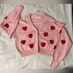 Condition New Size M Trendy Heart Print Cardigan For Fall, Fall Long Sleeve Heart Print Outerwear, Casual Long Sleeve Heart Print Outerwear, Cute Red Long Sleeve Cardigan, Fitted Heart Print Sweater For Fall, Casual Heart Print Cardigan For Spring, Cute Red Spring Sweater, Trendy Winter Outerwear With Heart Print, Casual Spring Outerwear With Heart Print