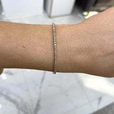 Brand: Levian    Gender: Ladies    Metal Type: 14K Rose Gold    Length: 6.25 Inches    Width: 3.30 mm tapering to 2.00 mm    Weight: 4.13 grams    Ladies 14K rose gold diamond tennis line bracelet. The metal was tested and determined to be 14K rose gold. Engraved with "14K". The "LeVian" trademark (or hallmark) can also be found on the item.    Pre-owned in excellent condition. Might shows minor signs of wear.    4-Prong Set in 14 Karat Rose Gold with:    Forty-three (43) round brilliant cut natural diamonds:    Measurements: 1.75mm - 1.90mm in diameter x ~1.11mm in depth.  Weight Range: 0.021 ct. - 0.027 ct.  Estimated Total Weight: 1.030 ct.  Color: Light Brown  Clarity: SI1 - SI2  Cut: Very Good  Polish: Very Good  Symmetry: Very Good  TOTAL WEIGHTS:    Total weight of diamond(s):~1.03 Rose Gold Diamond Tennis Bracelet With Jubilee Style, Flexible Rose Gold Diamond Bracelet, Anniversary Rose Gold Tennis Bracelet With Diamond Accents, Classic Flexible Rose Gold Tennis Bracelet, Rose Gold Flexible Tennis Bracelet For Anniversary, Flexible Rose Gold Diamond Bracelet For Anniversary, Chocolate Diamond, Modern Bracelets, Brown Chocolate