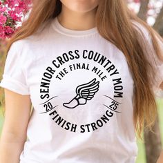 Super soft and unique cross country senior mom shirt 2025. "The Final Mile. Finish Strong. Fun to wear all season, especially on cross country senior night. Links to other versions: senior: https://www.etsy.com/listing/1762964303/cross-country-senior-night-gifts-2025 senior: https://www.etsy.com/listing/1762967633/cross-country-senior-night-gifts-2025 mom: https://www.etsy.com/listing/1762992877/cross-country-senior-mom-shirt-2025-the mom: https://www.etsy.com/listing/1748801210/cross-country-senior-mom-shirt-2025-the dad: https://www.etsy.com/listing/1763026695/cross-country-senior-dad-shirt-2025-the dad: https://www.etsy.com/listing/1748834270/cross-country-senior-dad-shirt-2025-the DETAILS: Unisex Soft-style T-Shirt - for men and women Brand: Gildan; Unisex Tee Material: 100% Ringspun C Cross Country Senior Mom Shirt, Cross Country End Of Season Gifts, Senior Night Gift Ideas Cross Country, Cross Country Senior Gifts, Cross Country Senior Night, Cross Country Mom Shirts, Cross Country Shirts Designs, School Tshirt Designs