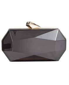 Modern angles and sophisticated gold-tone hardware bring instant appeal to the I.N.C. International Concepts Nichole Lucite Clutch.


 	Mini sized bag; 7-1/4"W x 3-1/2"H x 2-1/4"D
 	24"L detachable strap
 	Snap frame closure
 	Gold-tone exterior hardware
 	Acrylic
 	Imported Easter Shopping, Purse Accessories, Mens Gift Sets, Baby Clothes Shops, Inc International Concepts, Dresses With Leggings, Sock Shoes, Baby Shop, Dark Gray