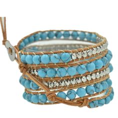 This five wrap signature bracelet features natural turquoise beads and gold gems on tan leather. Layer it up for more impact! Color: Natural turquoise beads and gold gems on tan leather Five wrap with adjustable closure Handmade One size fits all Adjustable Turquoise Wrap Bracelet For Festival, Adjustable Hand Wrapped Leather Wrap Bracelet, Adjustable Beaded Turquoise Leather Bracelet, Adjustable Turquoise Beaded Leather Bracelet, Turquoise Hand Wrapped Wrap Bracelet, Adjustable Turquoise Hand-strung Wrap Bracelet, Bohemian Leather Wrap Bracelet, Adjustable, Bohemian Leather Wrap Bracelet Adjustable, Bohemian Adjustable Leather Wrap Bracelet