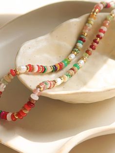 Add some color to your outfit with our Sunny Non-Tarnish Boho Color Beaded Necklace! Show your love for bright colors with this stunning piece. Not only does it add a pop of color, but it's also non-tarnishing for long-lasting wear. Perfect for any boho style lover. Non-Tarnish Boho Color Beaded Necklace Stainless Steel Natural stones & Pearls Chain Length (inch): 15 Extension Length (inch): 2 Color Beaded Necklace, Boho Color, Colorful Boho, Pearl Chain, Women Clothing Boutique, Chain Lengths, Chain Length, Boho Style, Boutique Clothing