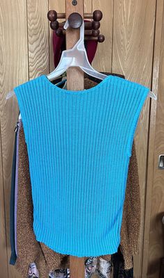 Vintage Blue Sleeveless Sweater Women’s Top Size Medium 1960s/70s  | eBay Blue Fitted Sweater Vest For Spring, Fitted Blue Sweater Vest For Spring, Retro Blue Vest For Spring, Retro Blue Sleeveless Top, Vintage Blue Vest For Spring, Blue Fitted Sweater Vest For Summer, Fitted Blue Sweater Vest For Summer, Blue Sweater Vest For Summer, Vintage Blue Sleeveless Vest