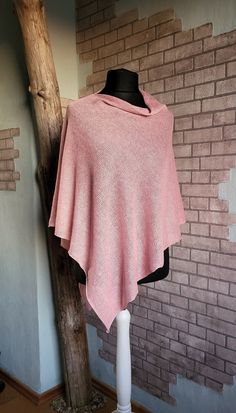 READY TO SHIP  Elegant, comfortable, wide knitted natural silk and linen poncho, shawl wrap. Silk and linen is breathable and most suitable material for the skin. Great accessory for occasions or everyday wearing. Material : 50% silk, 50% linen Colour: Light pink. ONE SIZE. Fits to sizes S, M,L,XL,XXL CARE INSTRUCTION: Gentle cool hand wash +30 C , lay flat on surface to dry.  For more knitted accessories and clothing, visit my shop: https://www.etsy.com/shop/LovesomeKnittings Thank you for shop One-size Knit Shawl Poncho, One Size Knit Poncho Shawl, Knit Fabrication One Size Shawl Poncho, Oversized Knitted Shawl Poncho, Oversized Knit Poncho Shawl, Oversized Knit Shawl Poncho, Pink One Size Shawl Poncho, Linen Poncho, Evening Shawls And Wraps