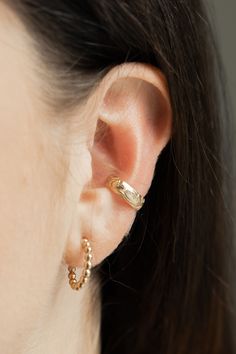 Flora Ear Cuff Made in 14k gold filled meaning it is tarnish resistant, water resistant, and the gold won't flake off! With proper care, gold filled metal can last many years.  Handmade Ethically Made Made in small batches Gold 14k Ear Cuff For Pierced Ears, Classic 14k Gold Ear Cuff, Gold Plated Ear Cuff For Everyday Wear, Classic Gold-plated Tarnish-resistant Ear Cuff, Everyday Gold Plated Ear Cuff, Hypoallergenic 14k Gold Ear Cuff For Everyday, Everyday 14k Gold Hypoallergenic Ear Cuff, Adjustable Gold-plated Tarnish-resistant Ear Cuff, 14k Gold Tarnish-resistant Ear Cuff Gift