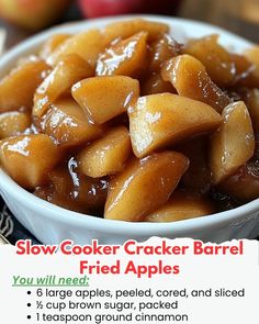 a close up of a bowl of food on a table with an advertisement for cracker barrel fried apples