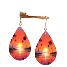 Wooden Teardrop Shaped Drop Earrings. Warm Colors In Pinks, Oranges, Lavender And Yellows Make A Gorgeous Sunset. Silver Tone Fishhook Earwire. Picture On Both Sides. Perfect For A Beach Trip Or When You Wish You Were There! Lightweight And Nwot! Summer Vacation Ear Wire Earrings, Pink Teardrop Earrings For Beach, Summer Vacation Earrings With Ear Wire, Multicolor Dangle Teardrop Earrings For Summer, Bohemian Dangle Teardrop Earrings For The Beach, Summer Teardrop Pink Jewelry, Summer Pink Teardrop Jewelry, Pink Teardrop Jewelry For Summer, Red Teardrop Jewelry For The Beach